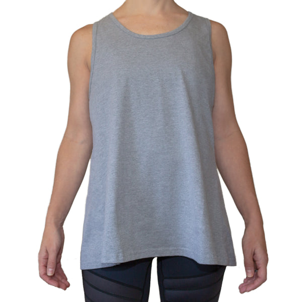 Fit For Barre Flowy Open Back Tank in black or heather grey, designed for a relaxed fit or tied in the back for a fitted style.