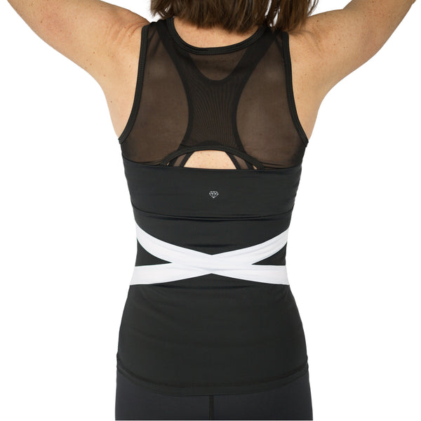 Fit For Barre White Banded Tank in a black nylon blend fabric and accented with a white band pattern around the waist and a mesh back.