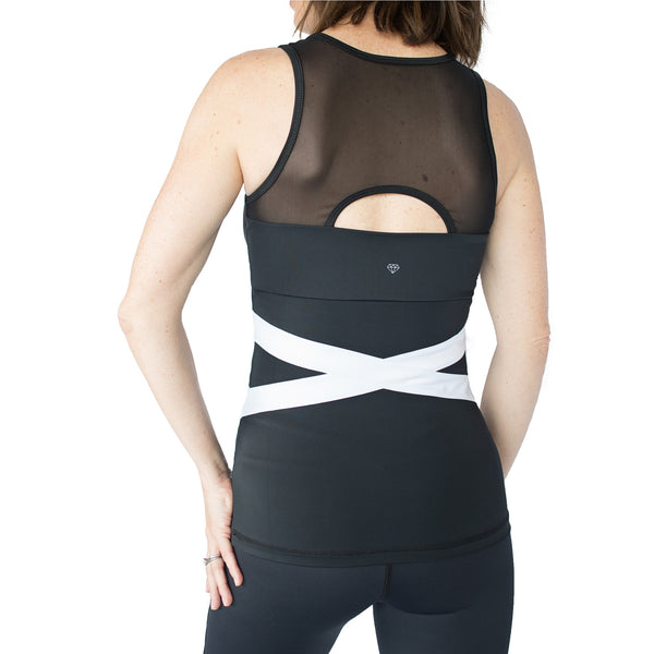 Fit For Barre White Banded Tank in a black nylon blend fabric and accented with a white band pattern around the waist and a mesh back.